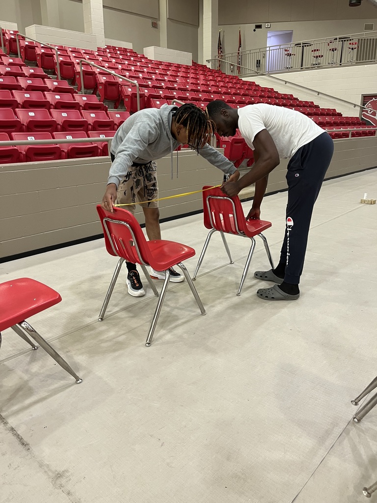 Juniors Kevin Cater and Rawlin Howell have been busy making sure every chair is perfectly place for The 2023 Graduation  Commencement Ceremony